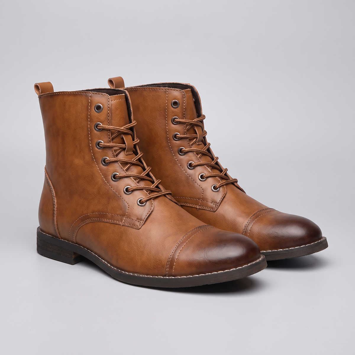 STATURE Outlaw tan leather boots front three-quarter view
